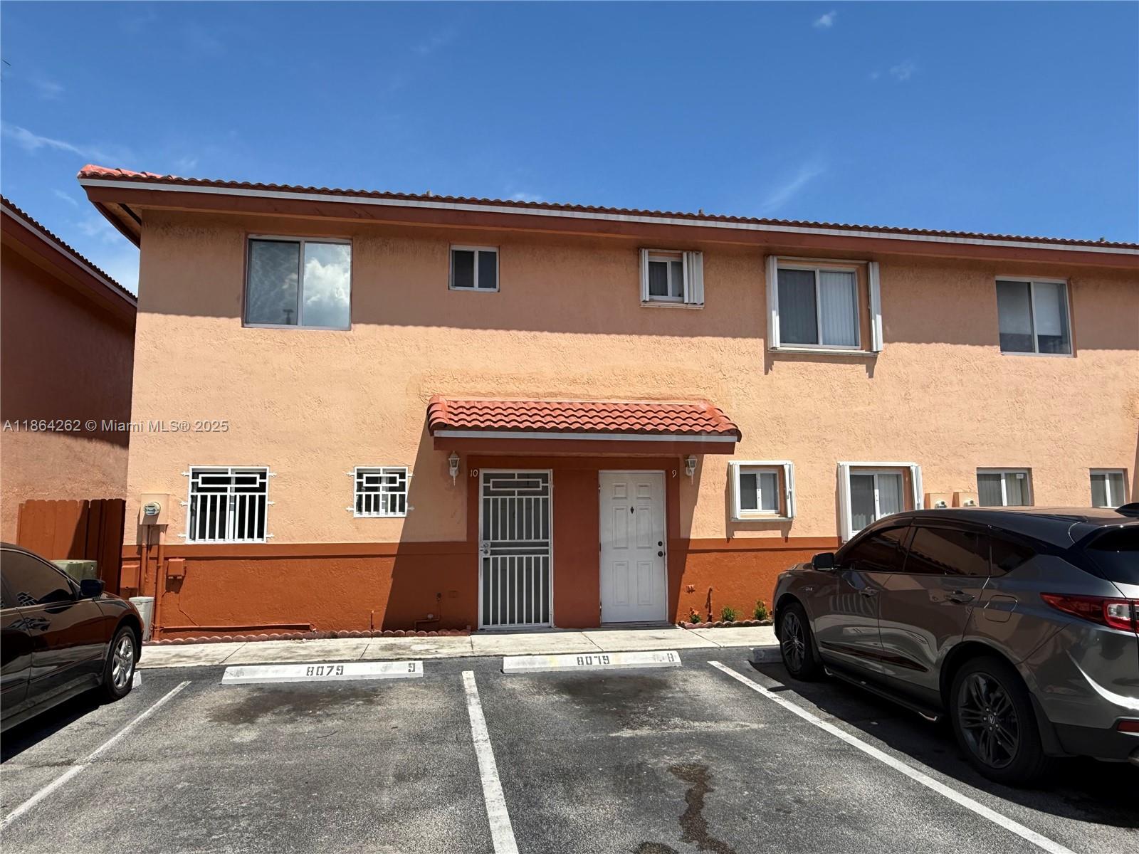 This 2-bed, 2.5-bath condo in prime location! This two-story residence features a functional layout with an open kitchen, spacious family/dining area, and convenient in-unit laundry on the first floor. Enjoy outdoor living with a covered patio and a cozy backyard. Each bedroom boasts its own en-suite bathroom, offering privacy and comfort. Includes 2 assigned parking spaces. Centrally located near top shopping, dining, and entertainment options, including Dolphin Mall, International Mall, and Marlins Stadium. Easy access to Miami International Airport, FIU, and major highways: Florida Turnpike, 836, and 826. A perfect blend of comfort and convenience!