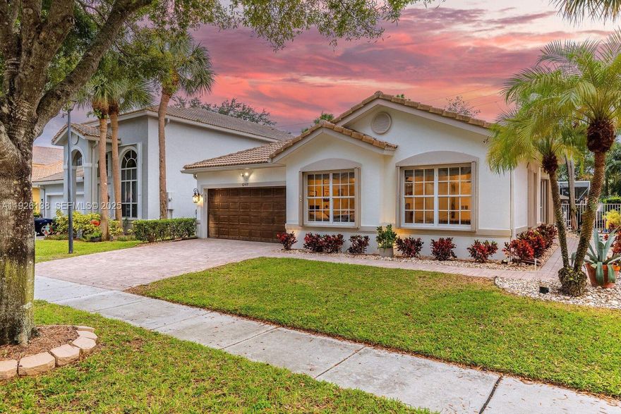 Welcome home to this beautifully maintained 3-bedroom, 2.5-bath + den, pool home tucked inside the gated community of Colony Preserve in Boynton Beach. With nearly 2,000 square feet of living space, this home blends comfort, function, and Florida charm. Step inside to high ceilings, tons of natural light, and an open layout designed for easy everyday living. The spacious family room flows right into the dining area and kitchen perfect for entertaining or relaxing after a long day. The kitchen features white cabinetry, granite countertops, stainless-steel appliances, and plenty of cabinet space with roll-out shelves, plus a large island perfect for entertaining. The owner's suite feels like a private retreat with two walk-in closets and a large ensuite bathroom offering dual sinks, a soaking tub with therapeutic jets, and a separate shower. Two additional bedrooms, a den and a full bath provide plenty of space for family, guests, or a home office. Step outside to your private backyard oasis complete with a sparkling pool, covered patio, and fenced yard with tropical landscaping. It's the perfect spot for weekend barbecues, pool days, or quiet evenings under the stars. Colony Preserve is a beautifully maintained, gated community offering a clubhouse, fitness center, pool, spa, playground, and sidewalks for morning walks or bike rides.
