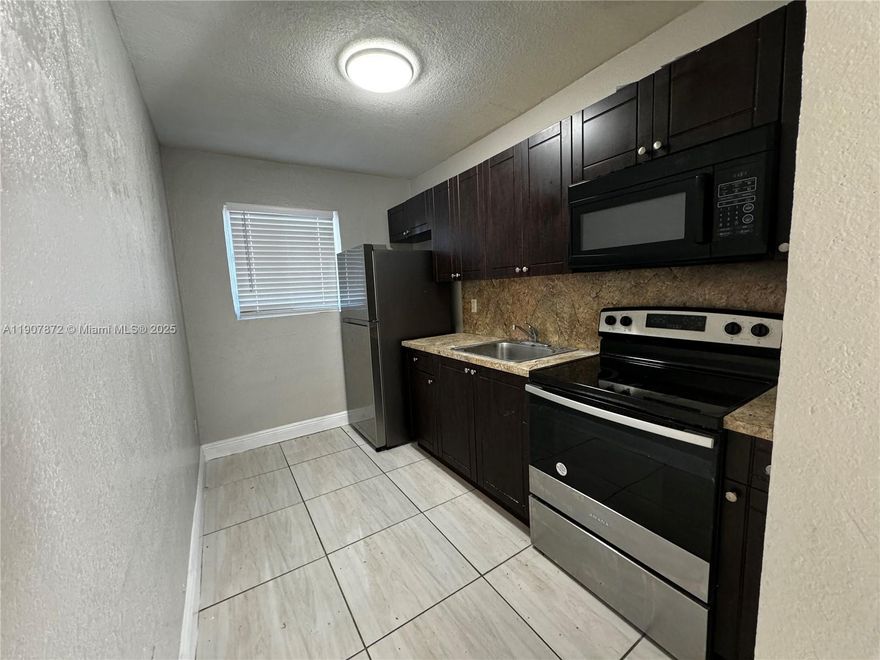 **RAPID MOVE IN AVAILABLE** Completely Remodeled 2 Bed 1 Bath apartment!! All Ages Welcome! No Association Approval Required!!! Unit features include all tile floors, stainless steel appliances, and updated kitchen and bath. Quiet living in a nice community in Opa-Locka. Section 8 welcome!! Newly remodeled apartments, close to restaurants and malls.