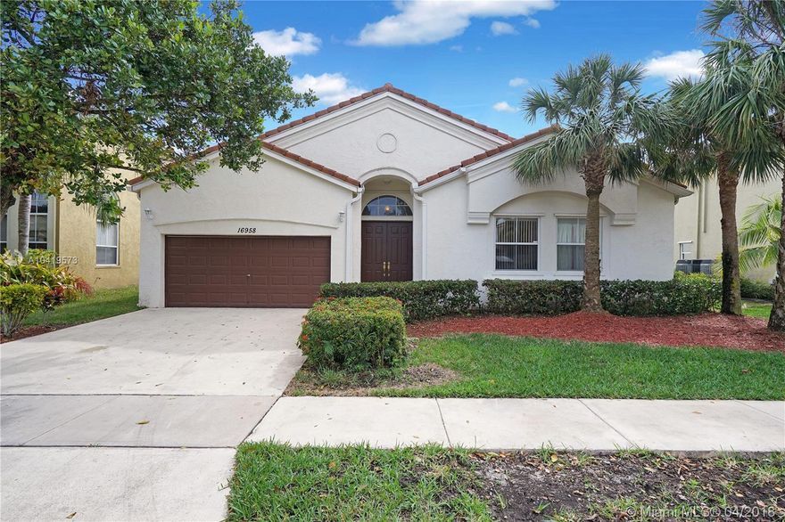 One story home with a very open plan in a beautiful small gated community in the West Pembroke Pines Area. The community offers a pool and gym. This is the first time this home is hitting the market, the original owner is the seller. This home is in very pristine condition. This home comes with 10 feet ceilings giving it a very open feeling. The owner has installed a solar water heater for the entire house which costed over $10k and will reduce up to 50% in electricity. The backyard is spacious enough to build a pool later on if you'd like.