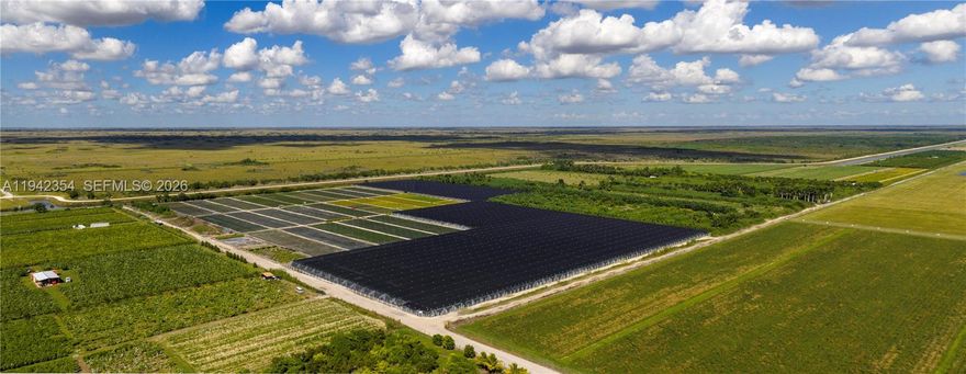 75 Acres of Improved Agricultural Land

Offered at $11,125,000 | Miami, FL 33030

A rare opportunity to acquire 75 acres of fully improved agricultural property in one of Miami-Dade’s most productive farming areas, directly abutting the Homestead General Aviation Airport. This unique positioning offers both immediate agricultural utility and long-term upside potential as the surrounding area continues to evolve toward airport-supporting industrial uses — positioning the property for future redevelopment value that could exceed $1,000,000 per acre.

Property Overview

Total Acreage: 75 acres

Shadehouse Area: Approximately 50 acres of improved shadehouse under active production

Open/Sun-Grown Area: Approximately 25 acres of open field cultivation with full irrigation

Zoning: AU (Agricultural)

Key Highlights

Exceptional Infrastructure: Extensive irrigation systems, concrete block beds, and improved drainage throughout the site.

Strategic Location: The property directly borders the Homestead Airport, offering exceptional logistical access and future potential for industrial or logistics-oriented zoning as regional airport expansion progresses.

Connectivity: Excellent access to US-1, Krome Avenue, and major agricultural corridors serving South Dade’s nursery and specialty crop markets.

Assemblage Opportunity: Ideal for large-scale operations or strategic land banking.
