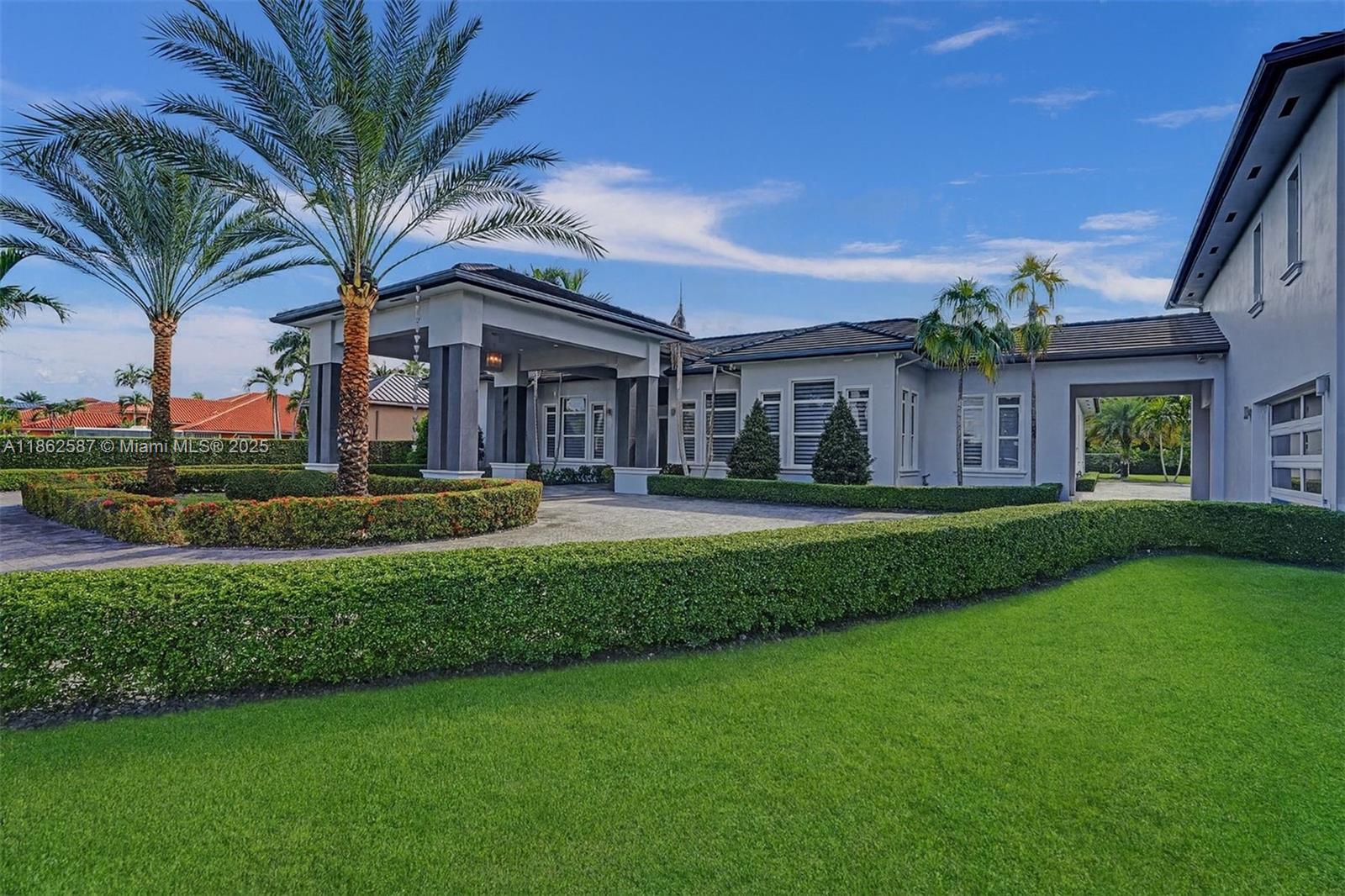Introducing Villa Imperia, a custom 2017 smart estate on an extraordinary 42,853 SF gated lot the largest on the market! These 6 beds, 4.5 bath residence boasts soaring 12’ ceilings, elegant open living spaces, and gas appliances throughout, including a Wolf chef’s stove. Entertain indoors with a sleek bar and a $100,000 theater room with stadium seating, or outdoors with a resort-style saltwater pool, summer kitchen, and expansive grounds. A 3-car garage with in-law quarters offers a private office and kitchenette, ideal for multi-generational living. Blocks away from Belen, Villa Imperia is where modern luxury meets timeless comfort.