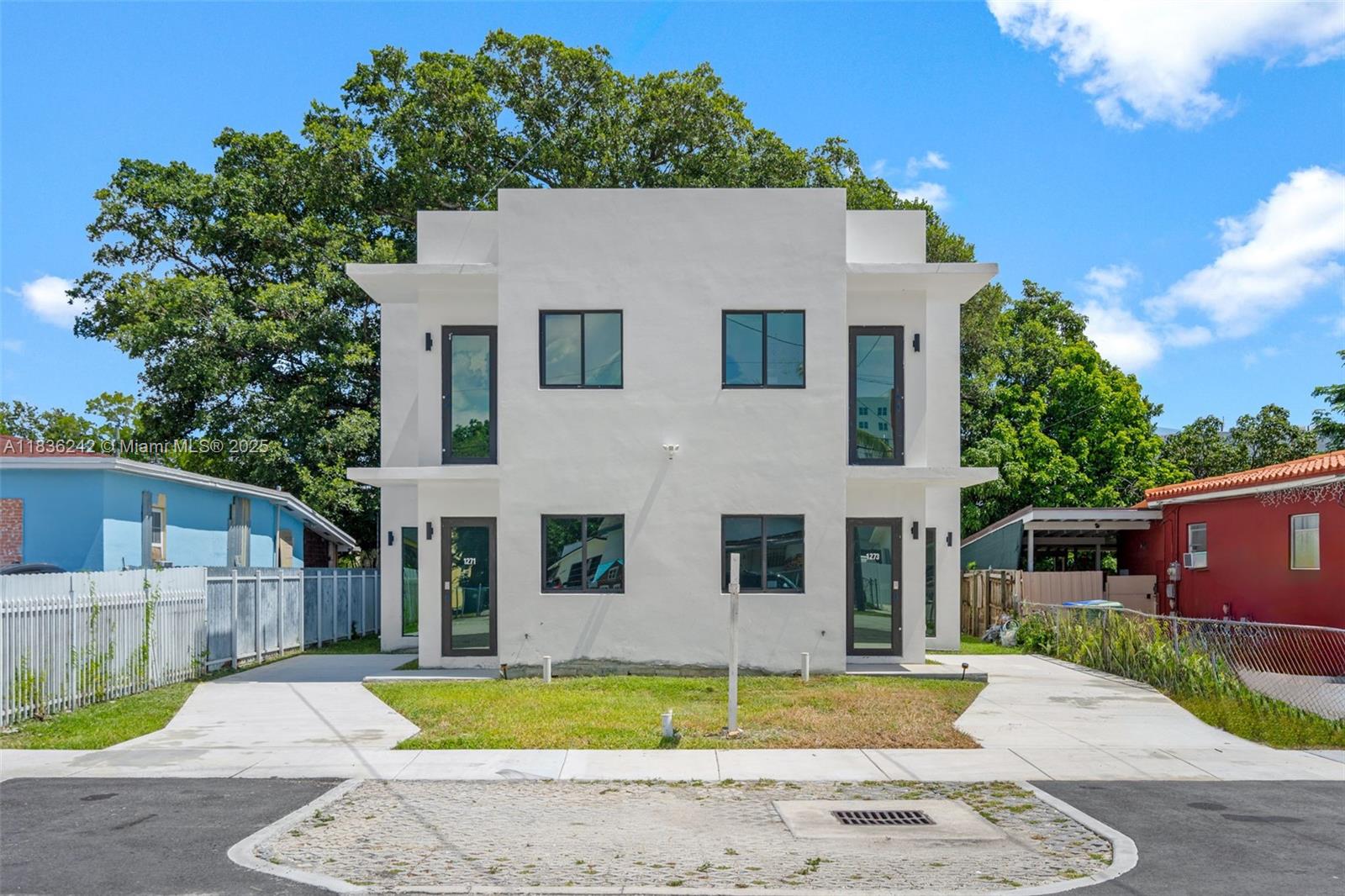 New Construction Luxury Twin Homes near Wynwood and Design district!. Four bedrooms and four bathrooms on each side. Alternatively, use as short term rental and building can make $16,000. Huge kitchen with beautiful new cabinetry and Carrara quartz countertops. Stainless steel appliances to be installed. Concrete flooring and concrete roof. Structure is a bunker! Large 60x60 porcelain tiles floor. Four brand new central A/Cs. CCTV Cameras already installed. Balcony in both front and back with modern railings. Concrete stairs with beautiful wood looking porcelain tile. Close to MIA, train station, Marlins Stadium and South Beach. Area is booming with luxury multi family buildings. Get in now!