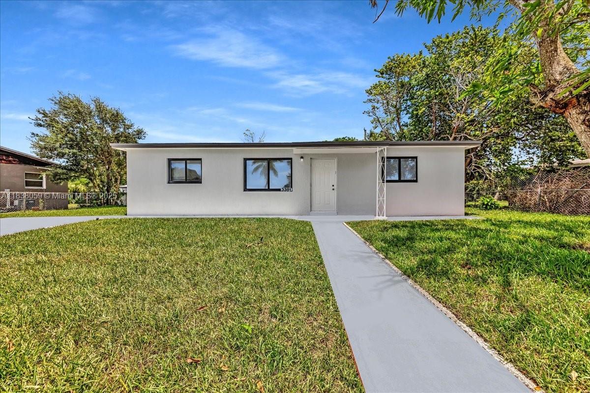 Discover this beautifully remodeled four bedroom two bath home featuring 1246sqft of modern living space on an ample 7500sqft lot. This move in ready gem boasts a brand new roof and driveway along with impact windows ensuring durability and energy efficiency. The open concept layout flows seamlessly, offering a bright and inviting atmosphere. The updated kitchen and bathrooms add a contemporary touch, while the lot provides endless possibilities for outdoor enjoyment or future expansion. Don't miss this opportunity! Schedule your showing today. Ask about our seller credit when you use our preferred lender.