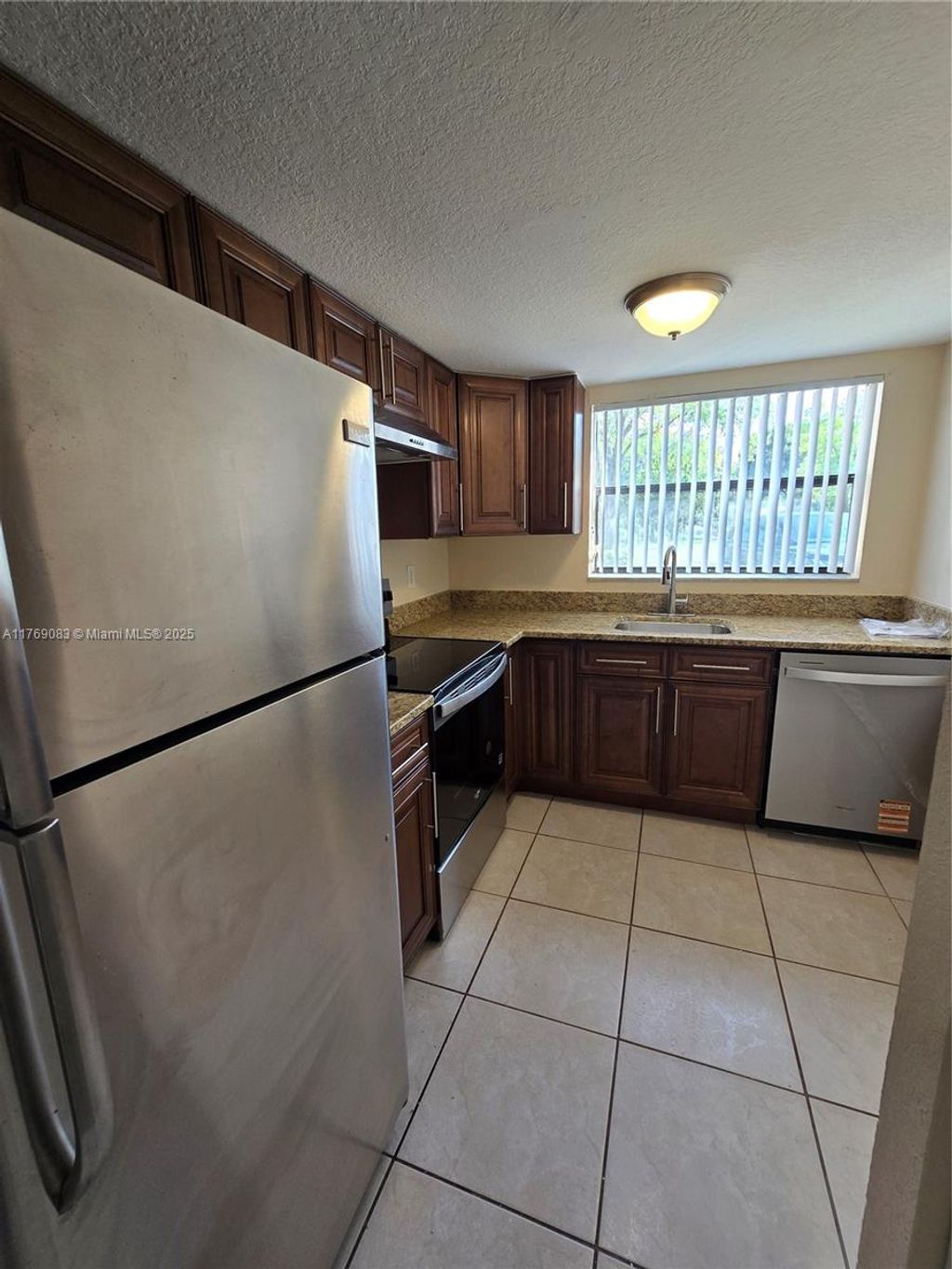 Photo of 4181 NW 114th Ave #4181, Coral Springs, FL 33065 (MLS # A11769083)
