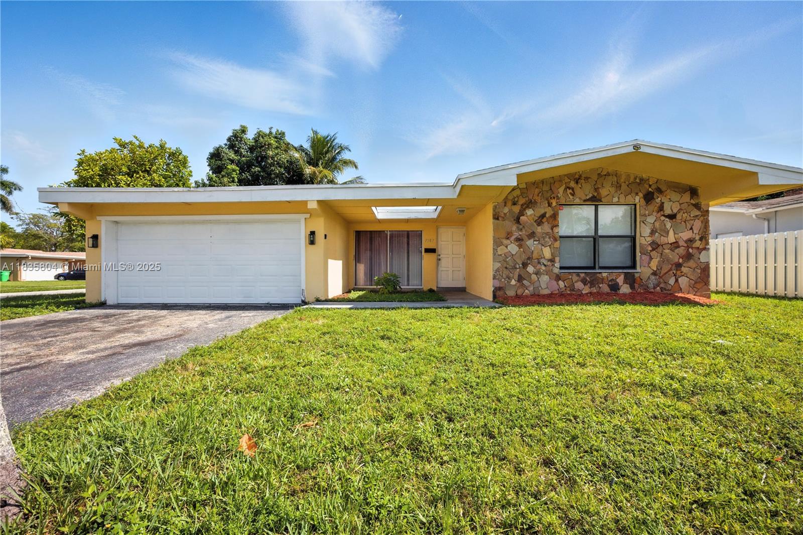 Well-maintained ranch-style home with 3 bedrooms and 2 bathrooms, offering a functional layout and a spacious interior. Includes a two-car garage and is in move-in-ready condition. This property provides comfortable living and is ideal for buyers seeking a ready-to-occupy home. The open living and dining areas flow seamlessly into the kitchen, creating a versatile space for everyday living or entertaining. The primary suite includes an en-suite bathroom and ample closet space. Conveniently located near local amenities, shopping, and schools.