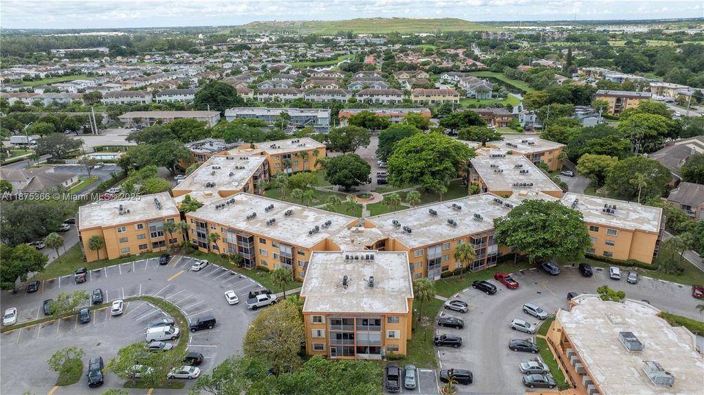 Photo of 4334 NW 9th Ave #8-2D, Deerfield Beach, FL 33064 (MLS # A11875366)