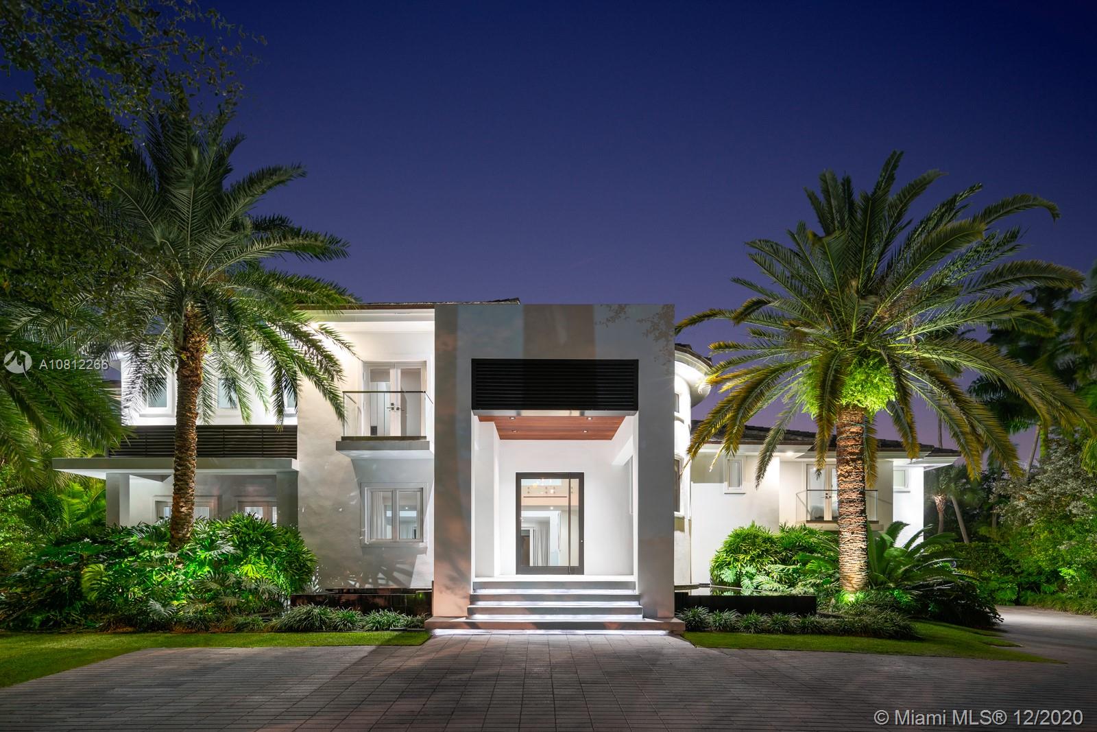 Fully redone fab waterfront.Live Glamorously…or Casually. Everything has been done for you, ready to enjoy. All new in 2014-17: façade wth water features, glass pivot door, landscaping and lot regrading wth Oolite borders, interior gutted and opened up, new large slab Limestone floors, Chef’s kitchen, glass staircase and railings, new lighting, wood floors upstairs, master suite reconfigured w 3 large walk-ins and spa bath, remod kids and guest baths, new beach entry pool. Enjoy high ceilings. All impact. BBQ Cabana/full bath.4 Suits+Staff Quarters+Office.Oversized 2 car garage and ample parking. Previously fully gutted, rebuilt, enlarged in 2008, see attached for sf larger than tax, 7703 total, 6164 living area. Subjetc to buyer due diligence. Plans Sq Ft larger than Tax. Buyer to verify.