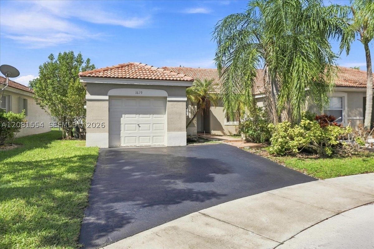 1619 Orion Ln, Weston FL 33327