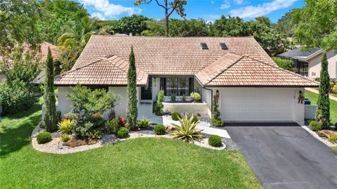 Photo of 8525 NW 49th Dr, Coral Springs, FL 33067 (MLS # A11827497)