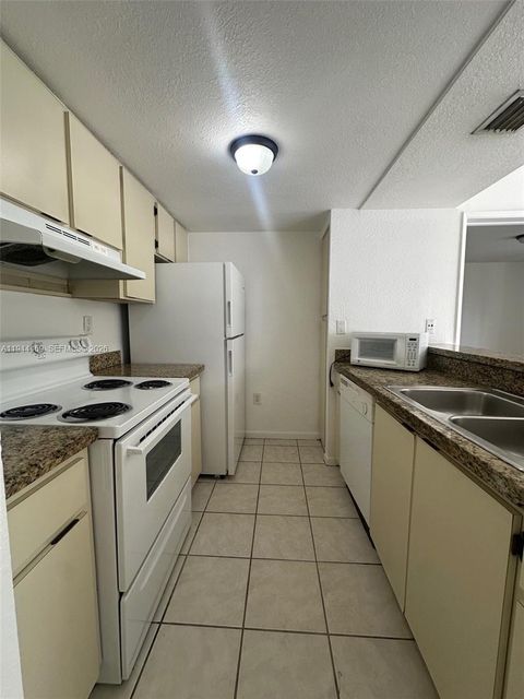 Photo of 7125 NW 186th St #B208, Hialeah, FL 33015 (MLS # A11944469)