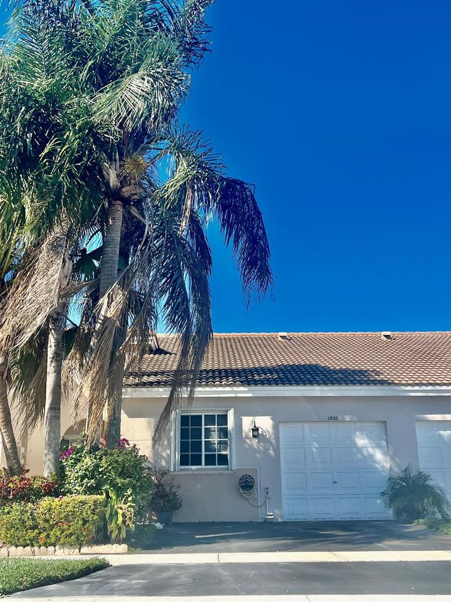 Stunning fully remodeled 2/2 lakefront villa in the Village of Renaissance! This home features a 3-year-old roof, energy-efficient A/C, a 1-car garage with space for 3 cars, and an integrated surround sound system. The modern kitchen boasts stainless steel appliances, a beautiful countertop, and plenty of cabinet space. Each room has its own updated bathroom. Enjoy lake views from the kitchen, living room, and master bedroom, all with hurricane shutters. The fenced backyard offers privacy and scenic views. The gated community includes tennis courts, a large pool, and easy access to highways and shopping. Perfect for first-time buyers or investors.