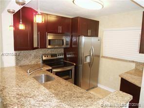 Beautiful condo en the heart of Kendall, 2 blocks away from Miami Dade College, near by expressways, gated community with pool and tennis courts, wood kitchen cabinets, granite counter tops & stain less steel appliances, polished travertine flooring, marble bathroom, laminate wood floor in bedroom built in closet, crown moldings & accordion shutters, facing canal.