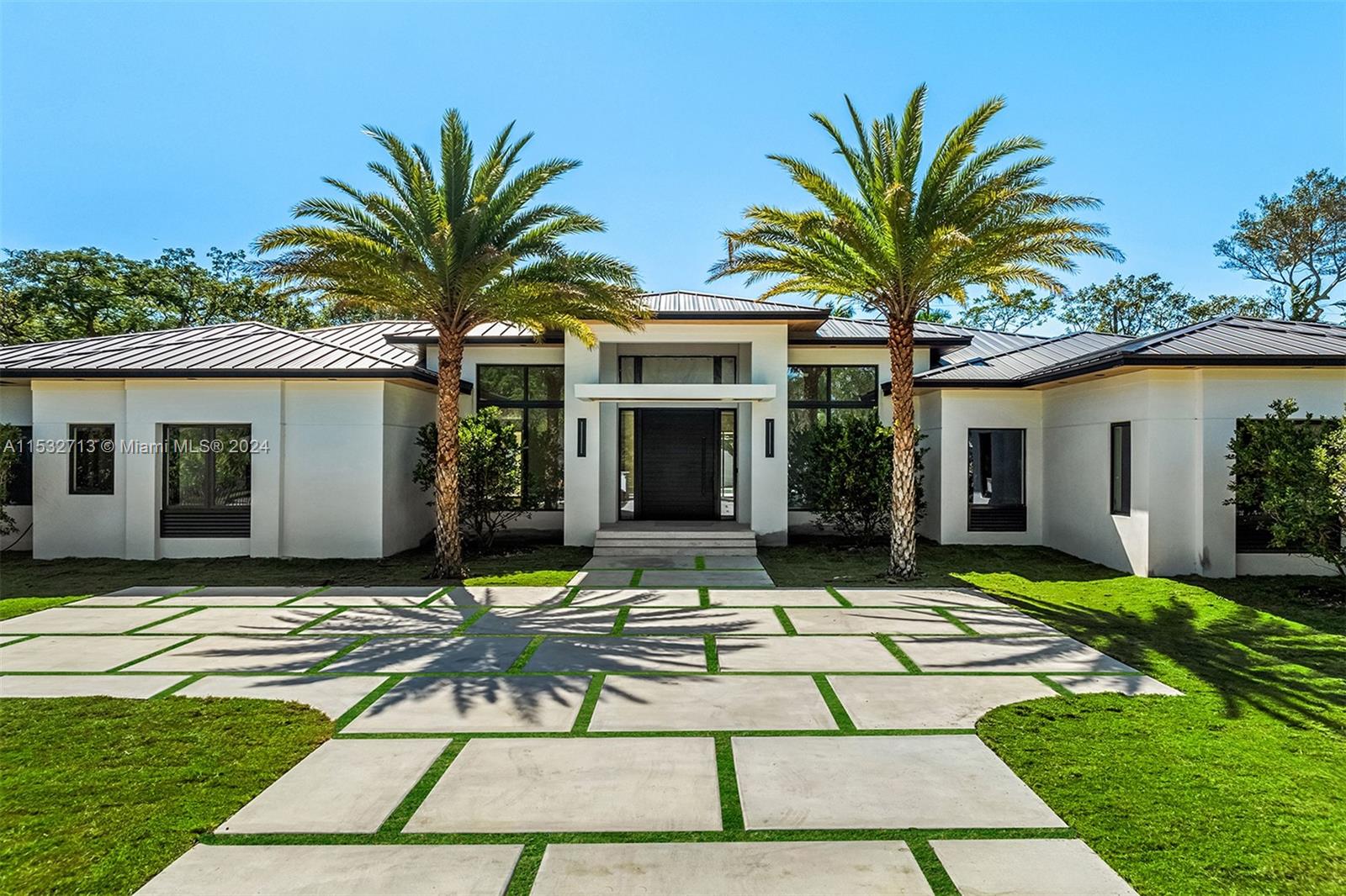 Savor the epitome of luxury in this new 2024 modern masterpiece. Nestled on pristine Pinecrest terrain, this opulent residence features 7 bedrooms and 7.5 bathrooms, complete with an attached garage. Step into an extraordinary floor plan showcasing a kitchen outfitted with state-of-the-art appliances. Bask in stunning outdoor views, enhanced by an underground pool, a covered terrace, and a sprawling yard. Additional amenities include an exercise room, study, detached guest house. Elite schools nearby.
