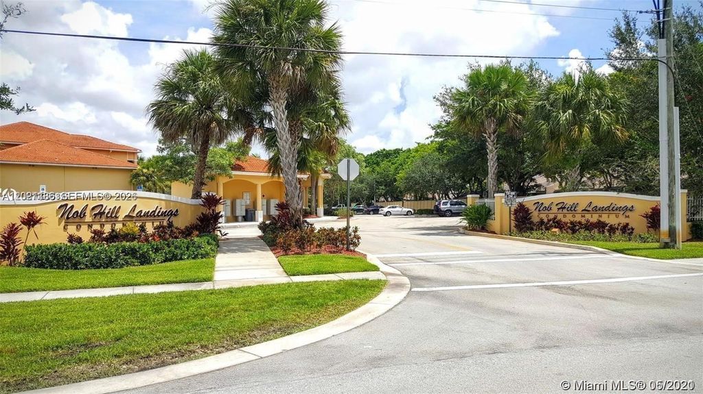 Photo of 9909 Westwood Dr #23-1, Tamarac, FL 33321 (MLS # A12021136)