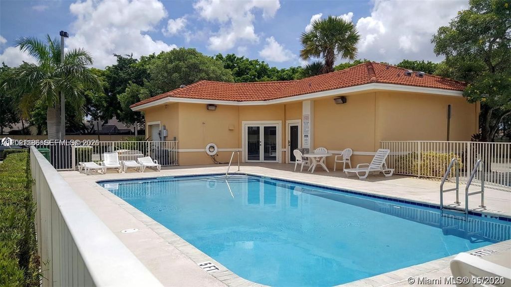 Photo of 9909 Westwood Dr #23-1, Tamarac, FL 33321 (MLS # A12021136)