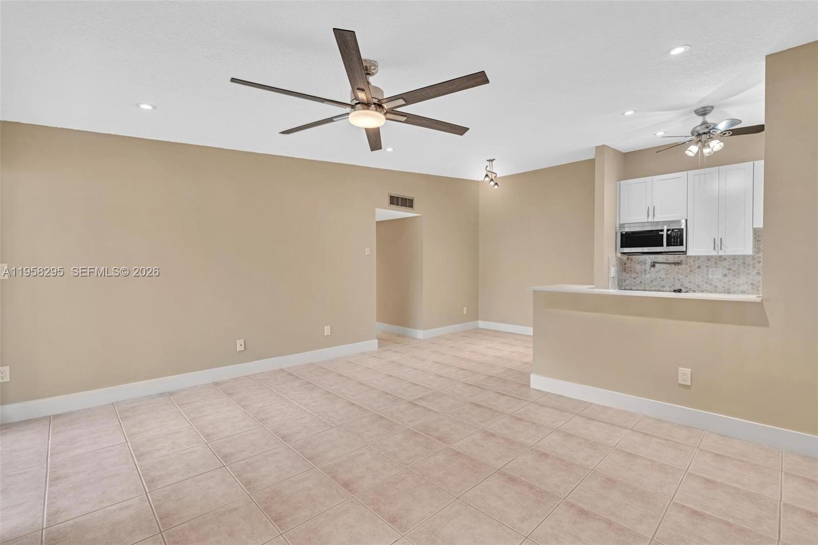 TAMARAC GARDENS CONDOMINI - Residential Lease