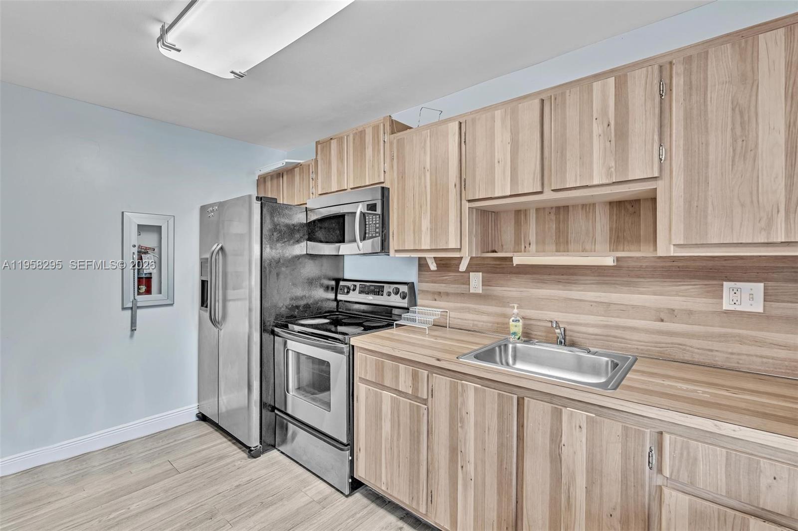 TAMARAC GARDENS CONDOMINI - Residential Lease