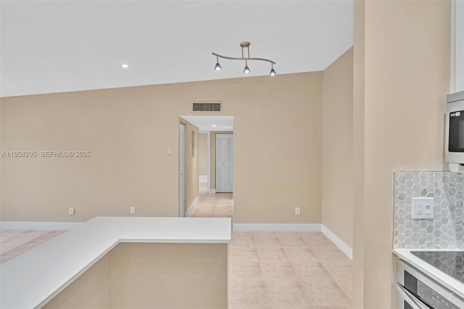 TAMARAC GARDENS CONDOMINI - Residential Lease