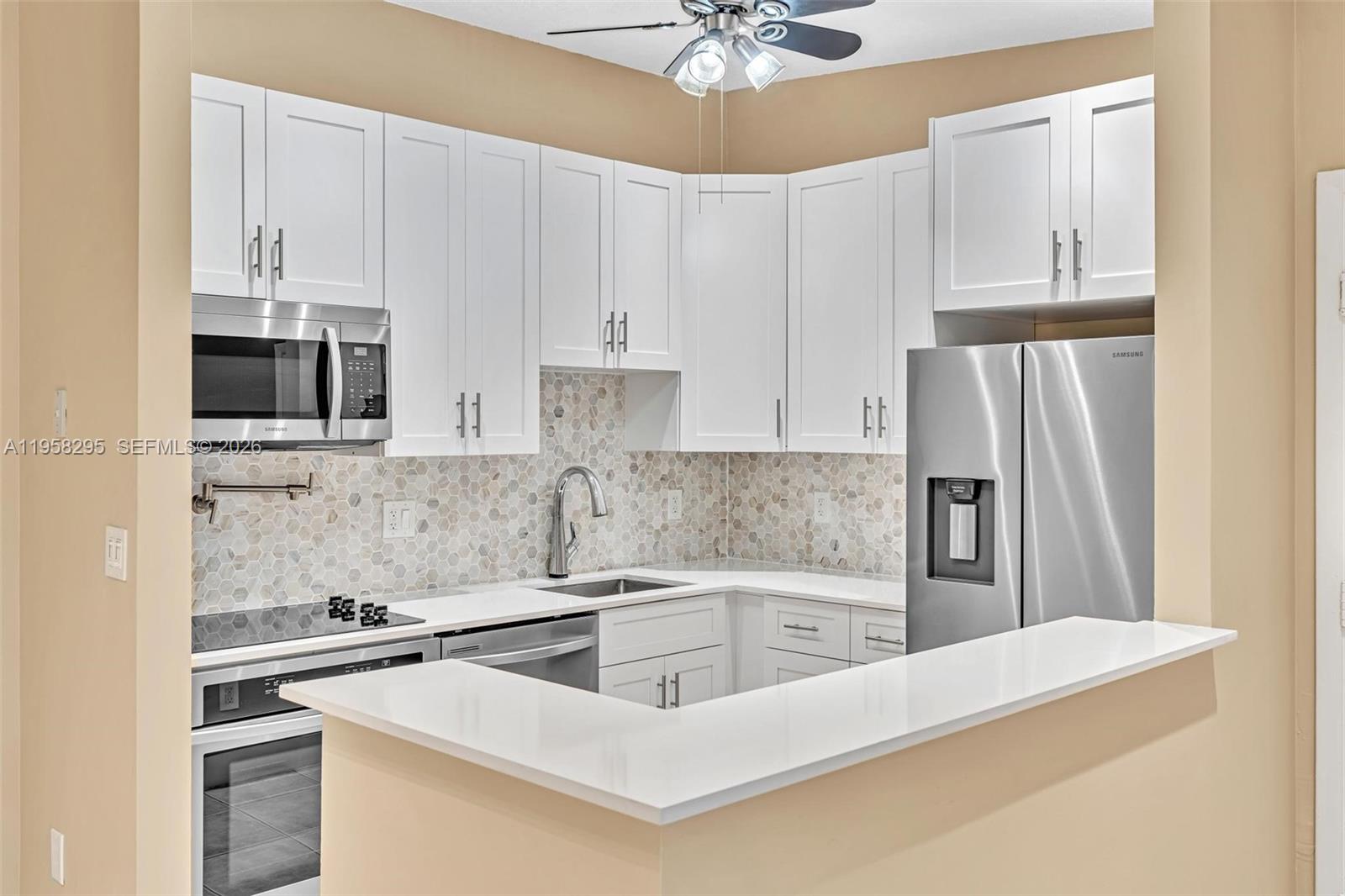 TAMARAC GARDENS CONDOMINI - Residential Lease