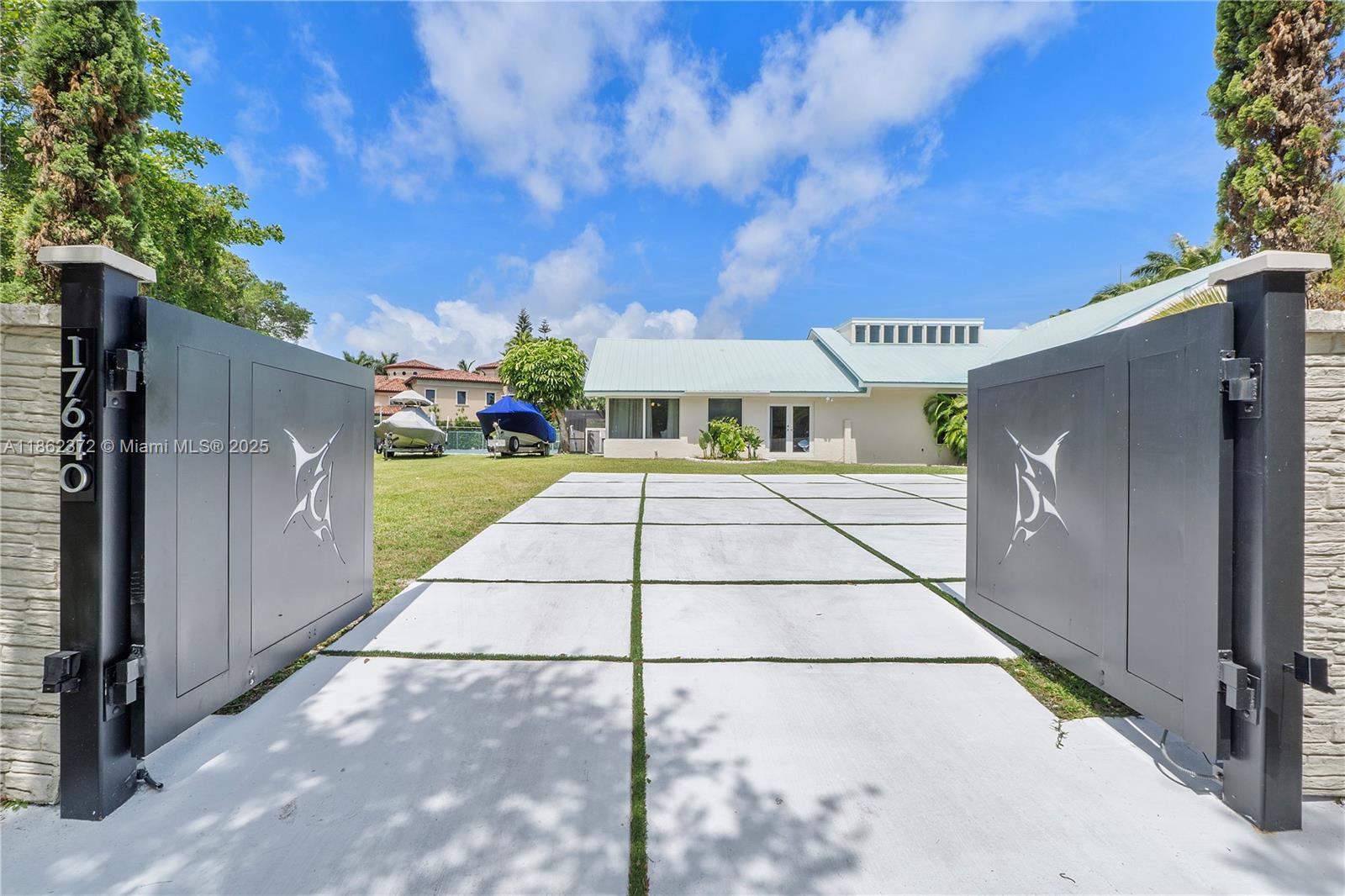 Who's ready to play pickle ball!! The perfect entertaining home is looking for it's new owner! One of a kind gated on historic Old Cutler Road in Palmetto Bay. Builders Acre, five bedrooms & three & a half bath Luxury Home. Amenities include you're own private pickle ball/tennis court, two fire pits, heated & cooled pool/spa, room for boat/RV parking, full outdoor kitchen, impact windows & doors, full indoor bar, renovated bathrooms, eat-in chef's kitchen including custom cabinetry, propane gas cooktop, stainless appliances, breakfast nook and pantry. Actual living square footage measures 4018 much larger than tax roll. Formal living and dining room, fireplace and giant media room for game day! See recent bank appraisal in MLS attachments.