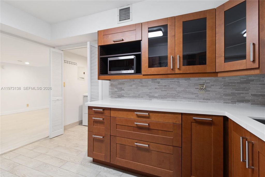 Photo of 16401 Golf Club Rd #102, Weston, FL 33326 (MLS # A11973138)