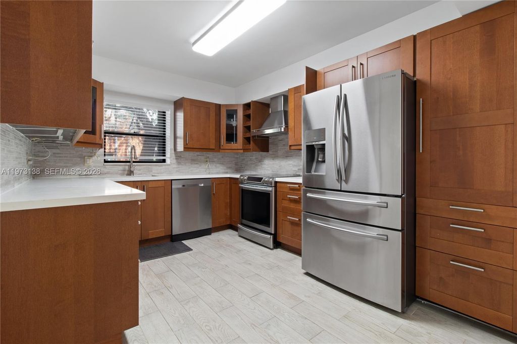 Photo of 16401 Golf Club Rd #102, Weston, FL 33326 (MLS # A11973138)