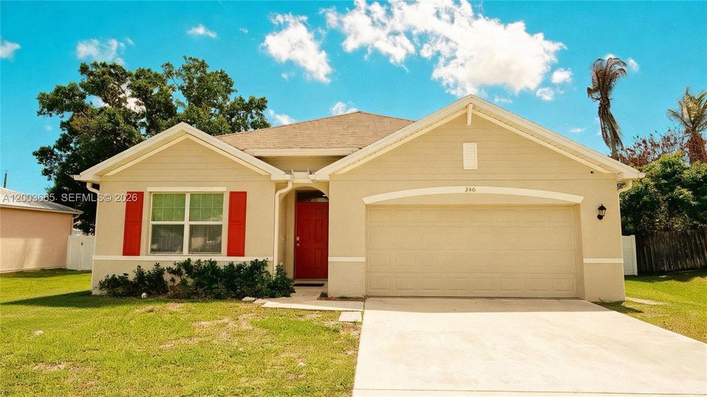 Photo of 2402 SE Gillette Ave, Port St Lucie, FL 34952 (MLS # A12003665)