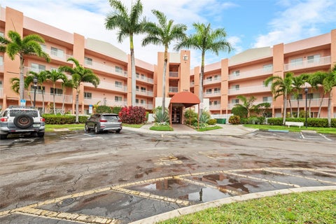 Photo of 7765 Yardley Dr #115, Tamarac, FL 33321 (MLS # A12013404)