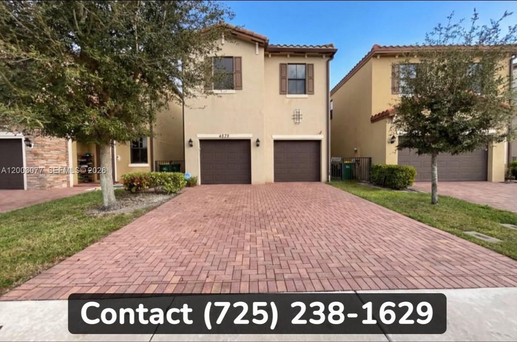Photo of 4877 NW 55th Pl #0, Tamarac, FL 33319 (MLS # A12003077)