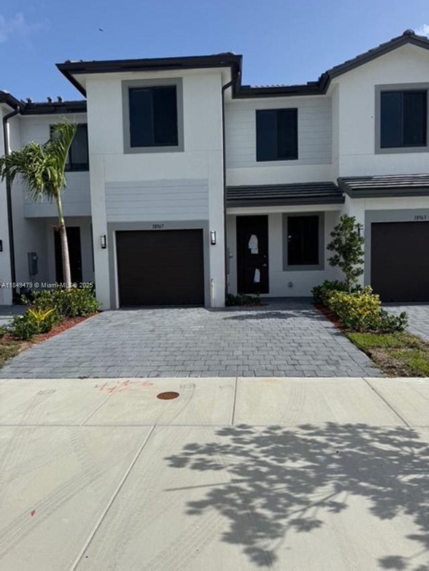 READY TO MOVE IN, NEW CONSTRUCTION, 3 BEDROOMS AND 2.5 BATHROOMS WITH ONE CAR GARAGE, ALL TILED-ON 1ST FLOOR, LAMINED FLOORS UPSTAIRS, IMPACT WINDOWS AND DOORS EASY TO SHOW.