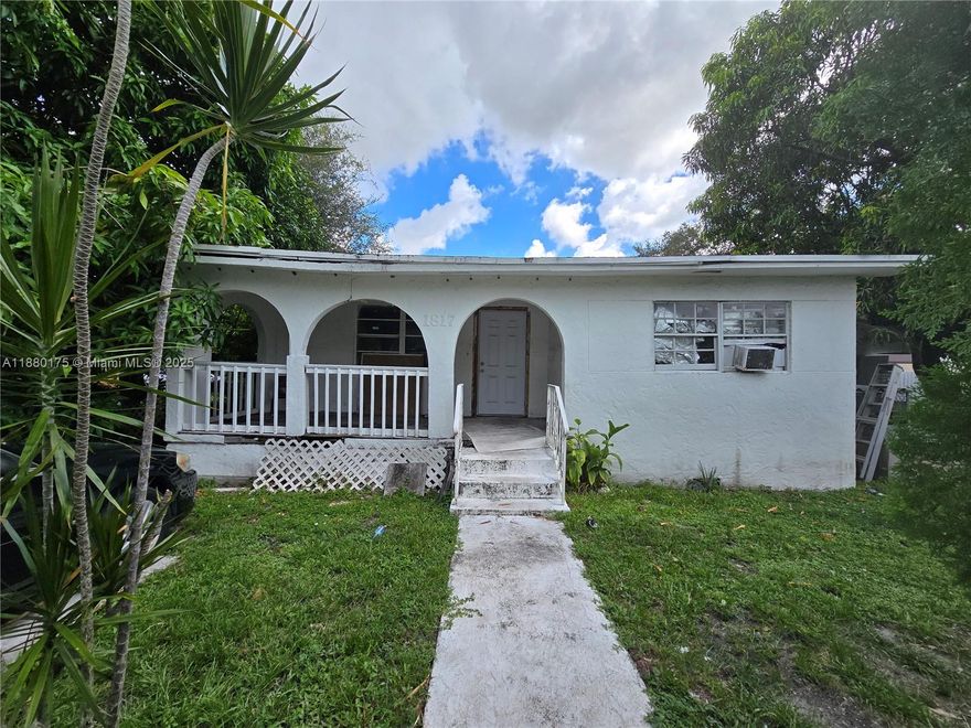 Non-conforming triplex situated in West Little River and near downtown Miami, presenting an exceptional opportunity for investors. This handyman special boasts a unique layout and substantial potential. Currently registered as a duplex on tax records with an added structure, it requires a discerning investor to legalize it as a triplex (three electric meters) or to rebuild anew, according to preference. One unit is currently occupied with an open willingness to either remain or vacate. The property's prime location offers proximity to beaches, entertainment venues, places of worship, and benefits from a robust rental market. Interested parties are encouraged to schedule an appointment to view the property's interior; timely action is recommended as interest rates may fluctuate.