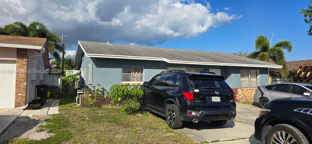 Photo of 565 NW 54th St, Boca Raton, FL 33487 (MLS # A11974490)
