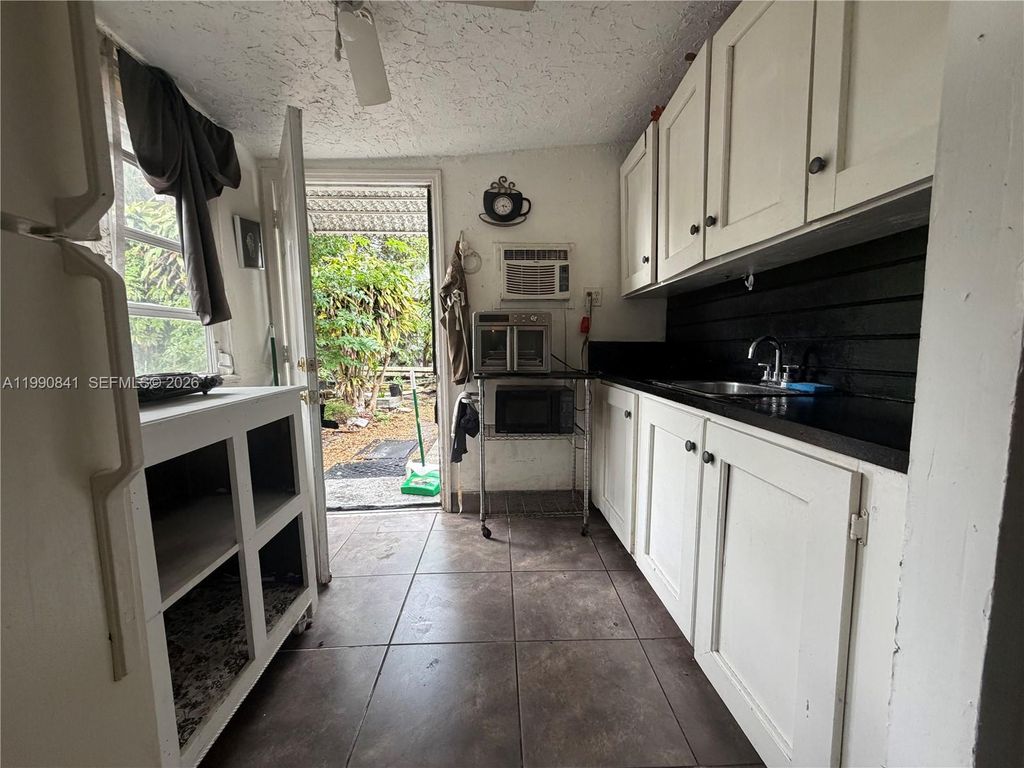 Photo of 22XX SW 42 Way #C, Fort Lauderdale, FL 33317 (MLS # A11990841)