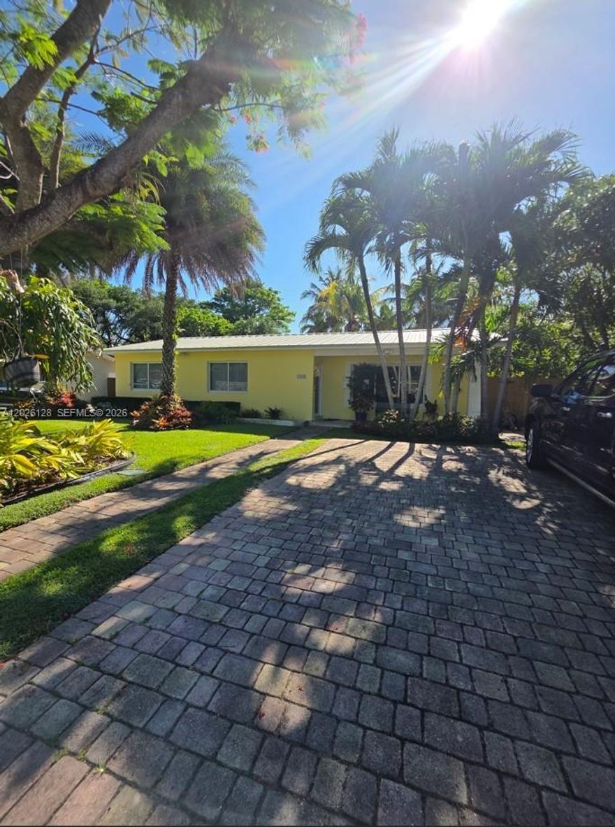 Located in one of Miami’s most desirable neighborhoods, this beautifully maintained 4 BD, 2 BA residence features full impact doors and windows along with a durable metal roof, offering both style and peace of mind. Situated at 8040 SW 63rd Pl, Miami, FL, this approximately 1,800 SF home offers the perfect blend of comfort, charm, and outdoor living on a spacious lot with serene lake views that create a peaceful and private setting.
The property features inviting curb appeal surrounded by mature landscaping and the charm of an established neighborhood. Inside, the home offers a functional layout filled with natural light and comfortable living spaces designed for everyday living and entertaining.
Step outside to a stunning covered terrace overlooking the sparkling pool and tranquil lake views — the ideal space for relaxing or hosting family and friends year-round. The entire backyard is protected by a full screened enclosure (pool cage/net), allowing you to enjoy the outdoor lifestyle comfortably and privately.
Conveniently located near top-rated schools, parks, shopping, dining, and major highways, this property offers easy access to South Miami, Coral Gables, Dadeland, and Pinecrest. A rare opportunity to own a waterfront home in a highly sought-after Miami location with endless potential and lasting value.