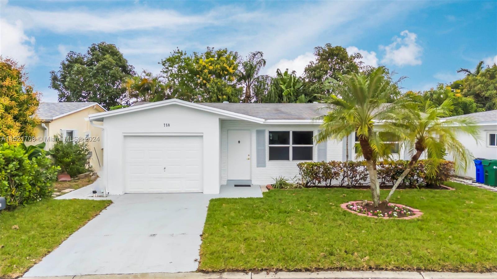 Don't miss this gorgeous single family home in desired 55+ Paradise Gardens IV, in the beautiful city of Margate. This gem feature 2 bright and spacious bedrooms, 2 full baths both with shower and one of them handicap equipped, large living and dinning room, a very nice tiled kitchen with newer top of the line appliances, an amazing  Florida room overlooking to a green belt for your relax or to entertain family and friends, large washer and dryer, a brand new A/C and ducts of the entire property has been just installed, all impact windows and sliding doors, all main areas and rooms have laminated floors, freshly painted, one car garage, clubhouse with pool, gym and lots of amenities, very low HOA, quiet and peaceful neighborhood, close to everything. Hurry up, at this price won't last!