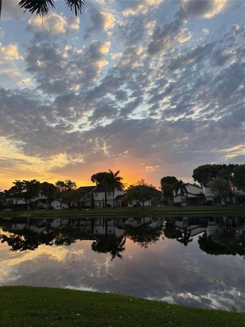 Photo of 317 NW 109th Ave, Pembroke Pines, FL 33026 (MLS # A11885971)