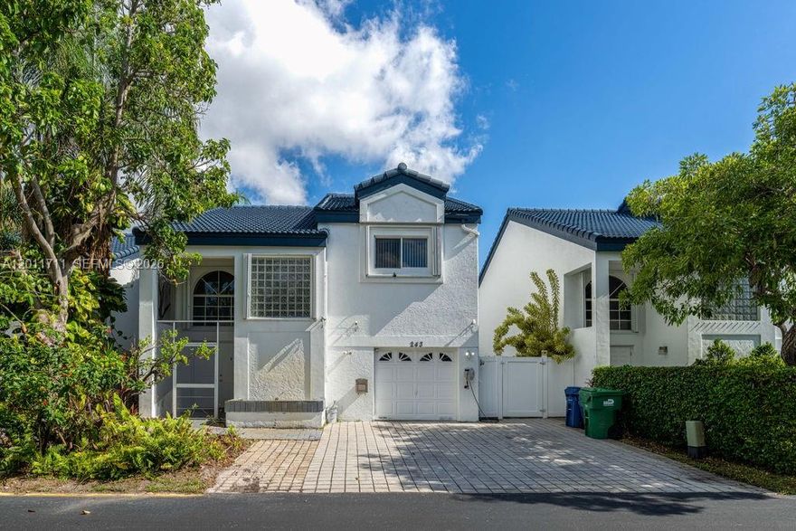 Beautiful 3-bedroom, 2.5-bath, 2 Story Home with all 3 bedrooms upstairs featuring carpet. Located in a gated, guard-secured community offering resort-style amenities. The home offers tile flooring throughout in downstairs level, The 1-car garage has been partially converted into a functional office with an elevated floor, ideal for working from home, it can easily be converted back. This original-owner property features a roof (2020), A/C system (2024 - 5-ton RHEEM), and a 50-gallon A.O. Smith water heater, stove. microwave (approx. 2 years old). The backyard is fully fenced and screened, and includes a permitted and HOA-approved extended metal roof patio perfect for outdoor living. Additional highlights include updated faucets (2025), impact windows only on sliding door and kitchen window, accordion hurricane shutters on the second floor (operable from inside), and a spacious driveway accommodating up to 4 vehicles plus guest parking. Located in a no flood zone. Community amenities include clubhouse, pool, jacuzzi, tennis courts, basketball courts, gym, pingpong, billiard. Monthly extermination, cable for 3 rooms and WIFI Internet, are all covered under the HOA and Maser Association. HOA paints the houses every 5 years. The home is conveniently located within a well-maintained community with 24-hour security. 15 minutes away from beautiful beaches, 5 minutes from Aventura mall, restaurants and shopping malls. HOA is building a kid's playground and pickelball courts.