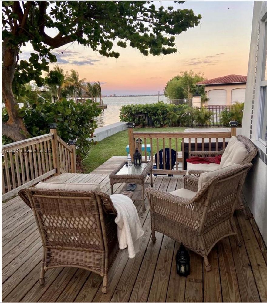 Enjoy INCREDIBLE UNOBSTRUCTED VIEWS of the BAY in this large 2 story architectural 1950's classic with a 130ft upgraded sea wall. This UNIQUE and rarely to be found property's 2232 sq ft living space sits on a huge 13,068 sq ft extra large plot one house from the open ocean. BREATHTAKING VIEWS of the sun rise on the bay, and enjoy the serenity from the oversized deck fronting the water. Exceptional location for BOAT/SEA LOVERS who have 1 or more boats and want to be able sail straight out on to the bay from the wide canal which has direct ocean access with no fixed bridges. This gem of a house has 3 db and 3 en-suites, living room has 14ft high vaulted ceilings with views of the the bay. Secluded pool/gdn. Single garage plus 5 parking spaces. Subject to planning could build 2 homes