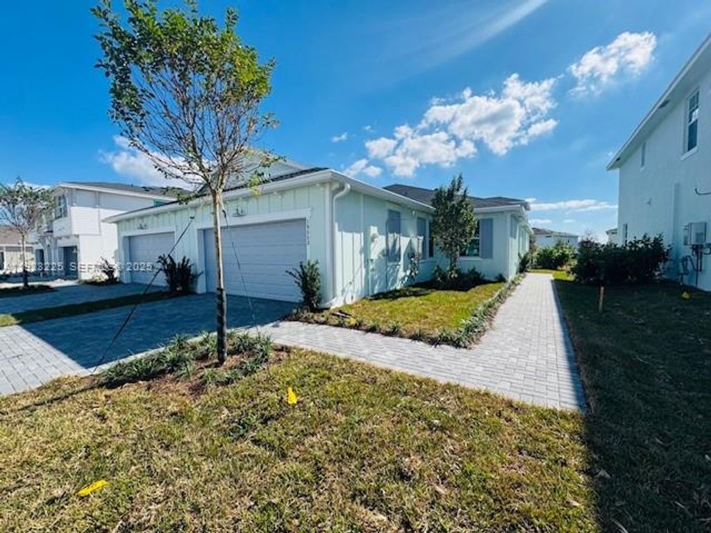 Photo of 19552 Whispering Creek Rd #1, Loxahatchee, FL 33470 (MLS # A11923225)