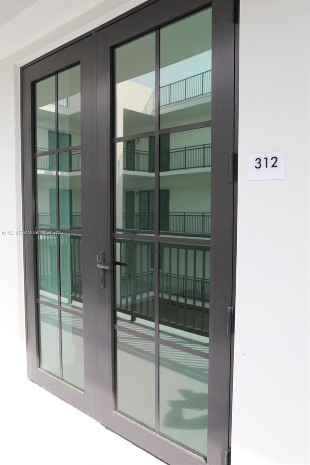 Photo of 4100 SW 64th Ave #312, Davie, FL 33314 (MLS # A11821877)