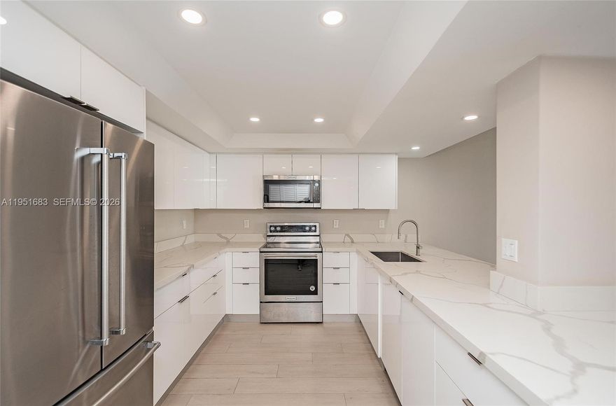 Experience luxury living in this 2 bedroom, 2 bathroom modern condo, nestled in the exclusive Brickell Key, Miami. Unfurnished. At over 1,400 Sq Ft and boasting panoramic views of the dazzling Miami skyline, this condo is a gem in the heart of the city. Amenities include 24-hour guard gate, concierge service, a pristine pool, fitness center, assigned covered parking, and a tennis court. Discover the vibrant sophistication of life in Miami!