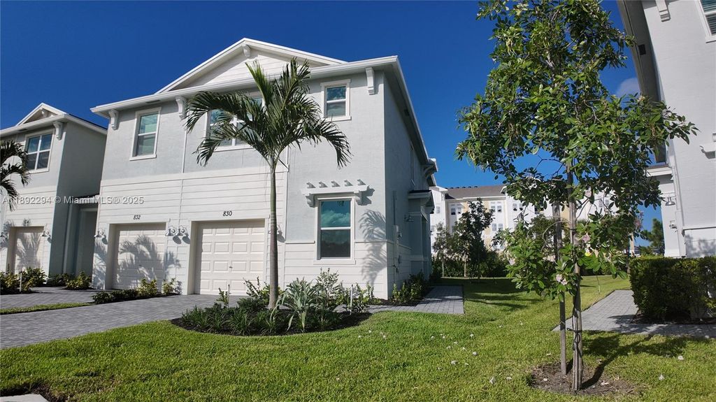 Photo of 830 SE Grovebush Ln #830, Port St Lucie, FL 34984 (MLS # A11892294)