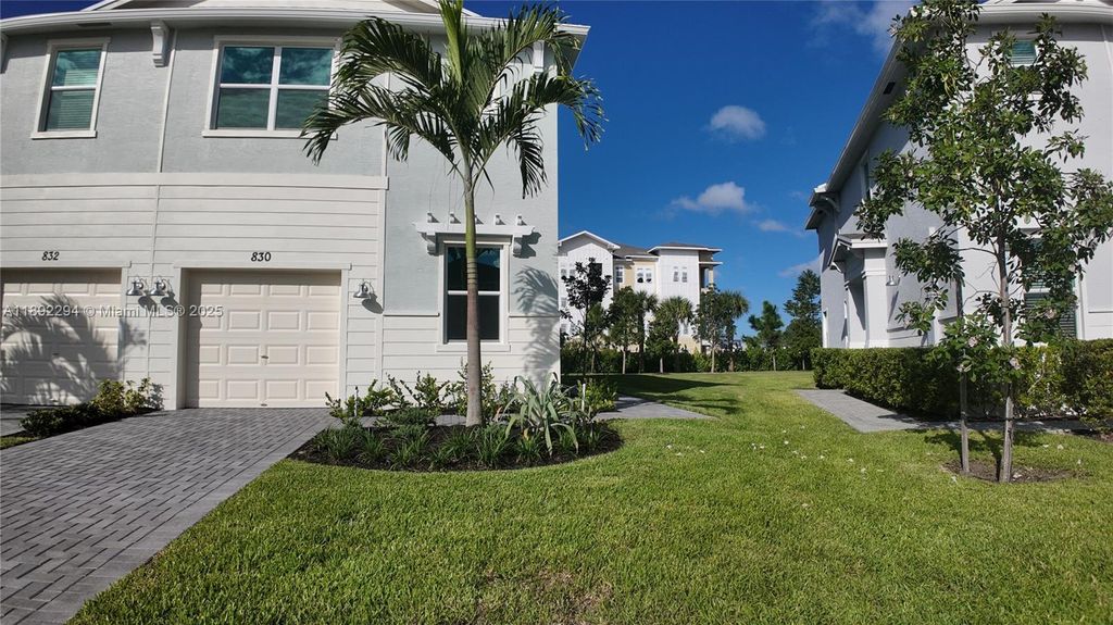 Photo of 830 SE Grovebush Ln #830, Port St Lucie, FL 34984 (MLS # A11892294)