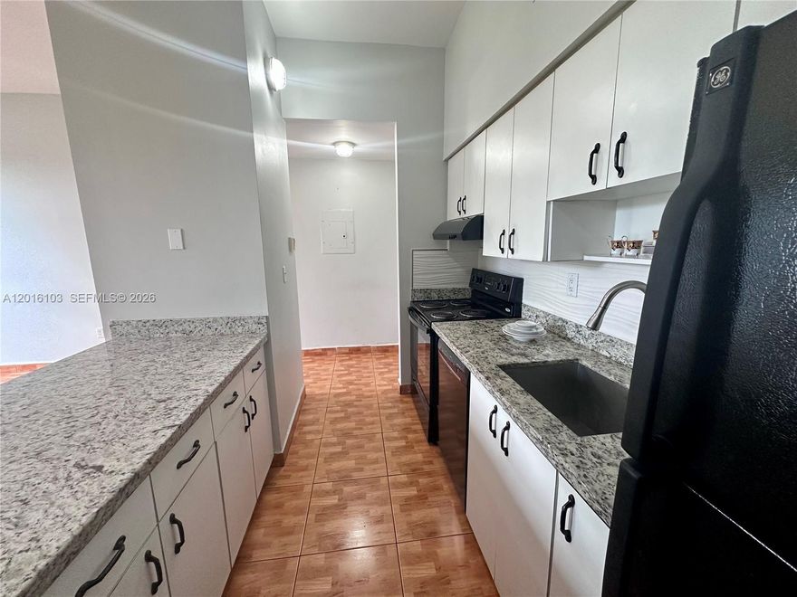 Excellent Location, Building with 2023 new roof, close to Palmetto Hospital and direct access to Palmetto Expressway 826. 2 Bedrooms with big space and big walking closets; 2 Full Bathrooms. Upgraded Kitchen with New Electric Stove, New Dishwasher, New countertops, New Backsplash, Ceiling Fans. All Unit Painted and cleaned. Condominium has security cameras, access gate, pool and plenty of guests parking. Common washer and dryer on each floor. Pet friendly. Low HOA & includes water. Milestone Inspections completed.