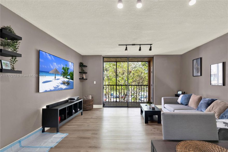 Welcome to Horizon West. This amazing property located in a warm, friendly, and peaceful gated community with 24-hour security. Inside, the home features thoughtful modern touches, such as custom closet cabinetry, a built-in wine cooler, and an upgraded air conditioning system (2021). Relax and unwind on your screened private balcony. Each floor offers a dedicated laundry room. Resort-Style Amenities Include: 4 Pools, Tennis Court, Racquetball, BBQ area, Tiki huts, Basketball Courts, Clubhouse & Billiard. Assigned parking space and plenty of guest parking. Residents enjoy proximity to great entertainment options, shopping, grocery stores, gas stations, and more. Experience the best of West Kendall by making yours this meticulously maintained residence!