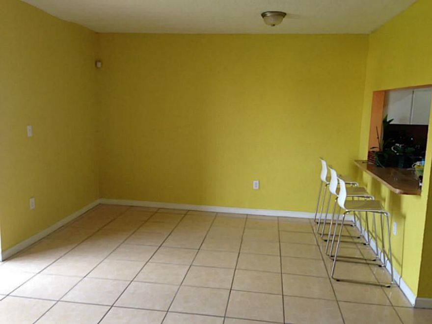 All tiled 3/2 condo on the 4th floor. Bedrooms are a nice comfortable size.  Enjoy this bright * breezy condo, community pool, with the convenience of having your washer and dryer inside the unit. Call listing agent for showings.