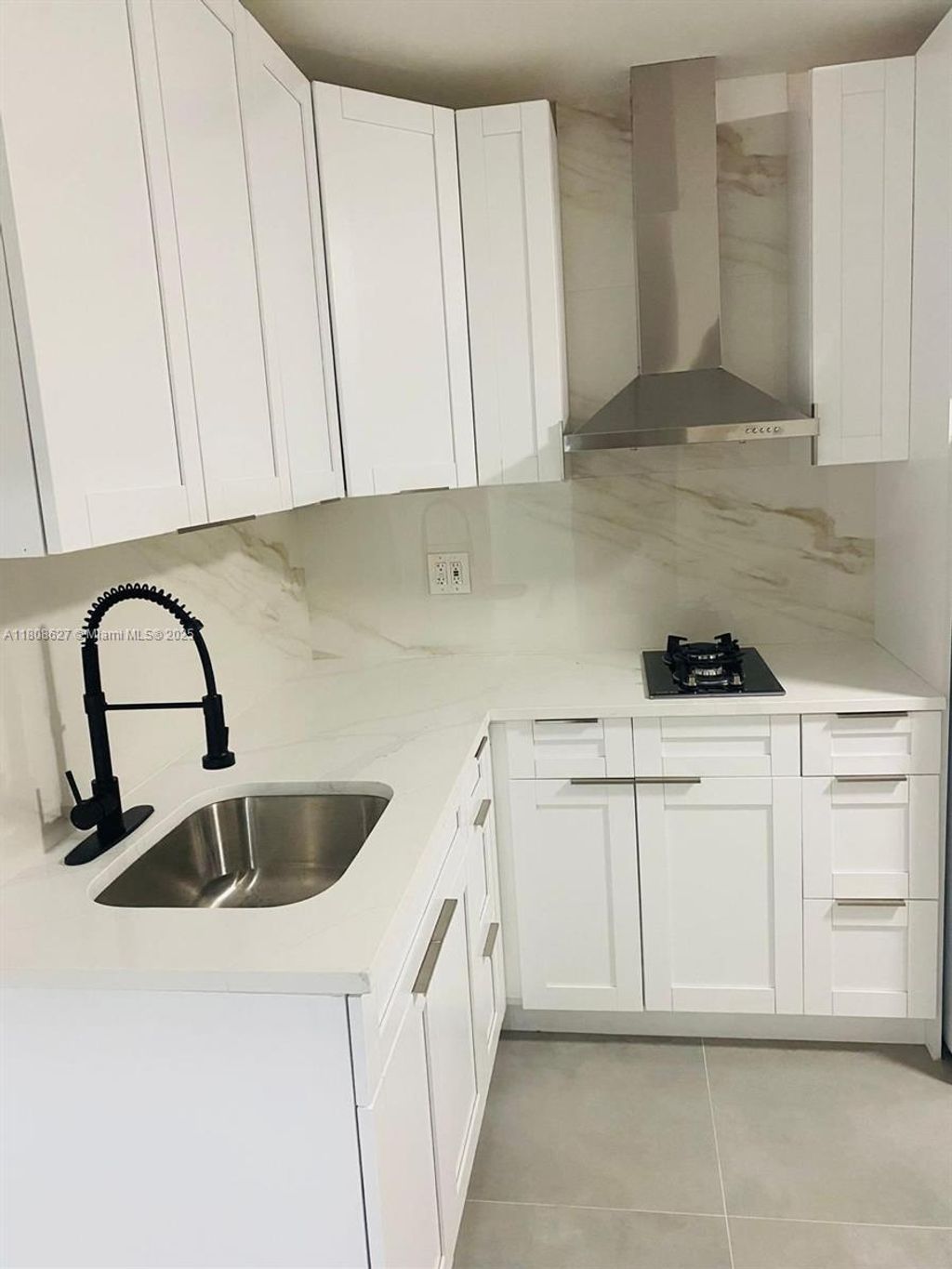 Photo of 2820 NW 14th Ct, Fort Lauderdale, FL 33311 (MLS # A11808627)