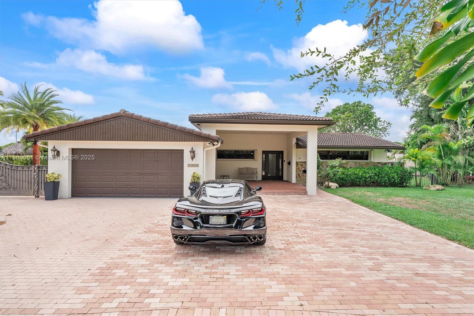 Lakefront living at its finest in Miami Lakes! Updated single-story 5BR/3BA on oversized 25,087 sqft lot.
The last home on a private cul-de-sac offers privacy, security & water views. Fully renovated throughout, with all rooms & baths updated. Open layout features wood-look tile, crown molding, recessed lighting & glass doors overlooking the pool & Lake Martha. Remodeled kitchen includes white cabinetry, granite, stainless steel & breakfast bar. Impact windows & dual A/C units ensure comfort & efficiency.
Outdoors features pool with lake views, large paver deck, covered patio & private dock — ideal for relaxing or evening sunsets. Oversized paved driveway fits 5+ cars, 2-car garage & lush landscaping. Near Main Street restaurants, shops, top-rated schools & parks.