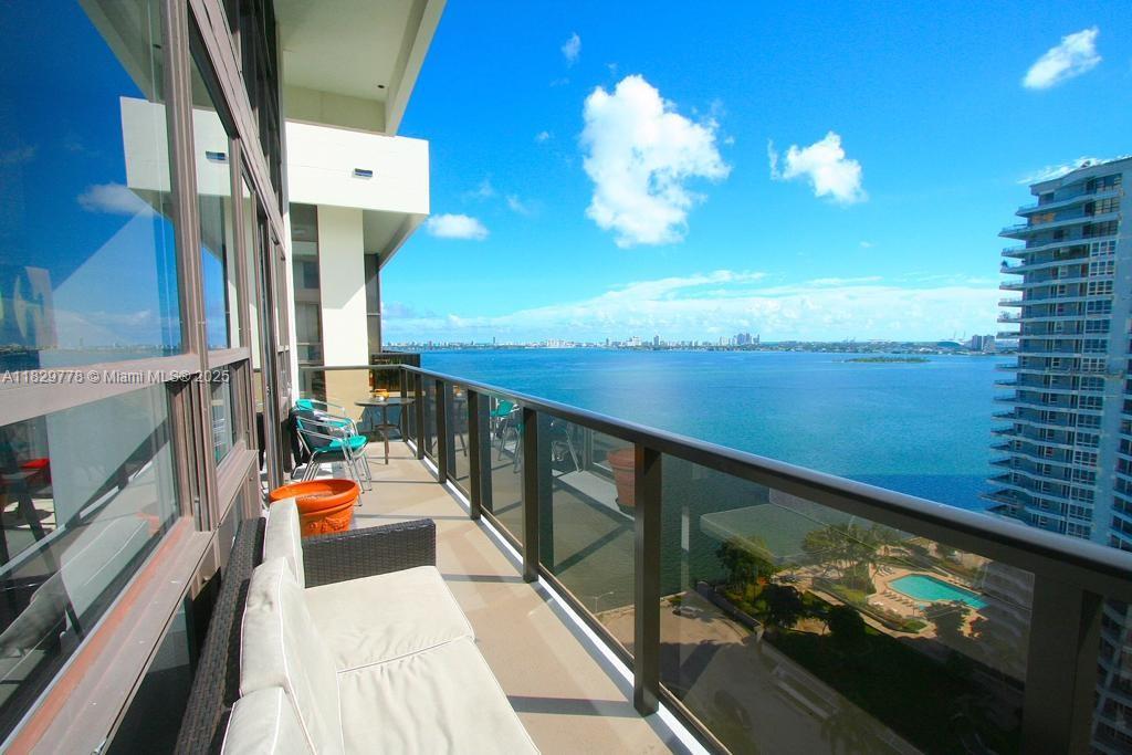Available Mid September 2025 this remarkable 2 Bedroom, 2.5 Bath, 2 story penthouse has amazing bay and cityscape views and over 1700 SF of living area! Fully Furnished and tastefully decorated this unit comes with 2 bedrooms upstairs with a split floor plan, 2 Full Baths upstairs, 1/2 Bath downstairs for guests and a huge Living and separate dining area downstairs for entertaining. Oversize balcony looking south at South Beach across Biscayne Bay. Rent includes high speed internet, cable, water, sewer, trash and parking as well as use of all amenities. Looking for that special renter that will take care of this property. Must have solid credit and references